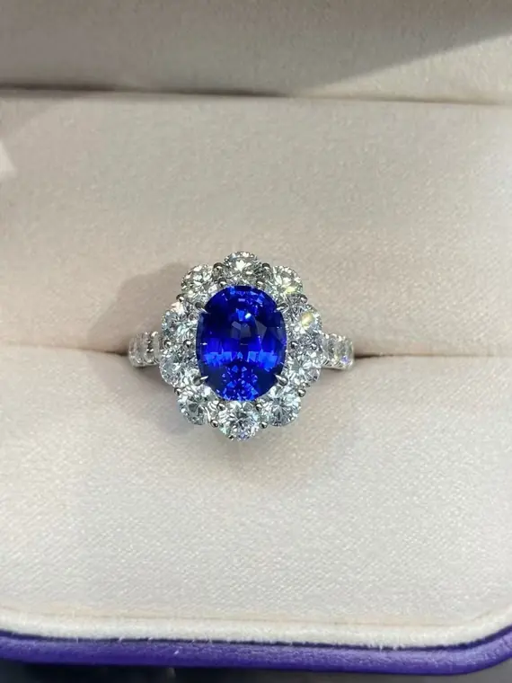 Gemformia royal blue gemstone ring sample with a halo setting